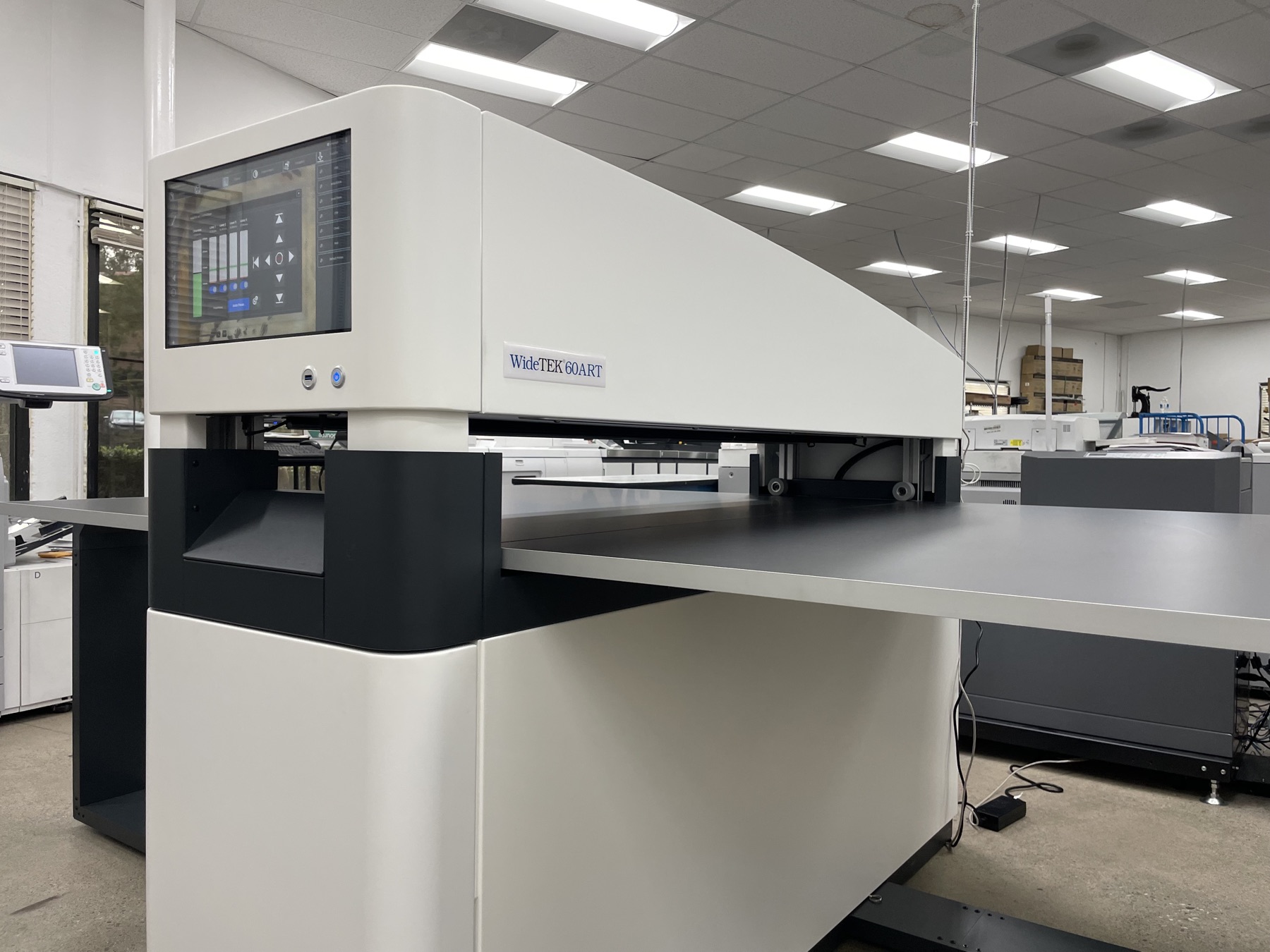 Control touchscreen on the WideTEK 60ART-800 scanner at Super Printers, Laguna Hills, CA, used to capture artwork before giclée printing