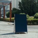 Blank sign board on a stand, representing custom memorial signage - Super Printers